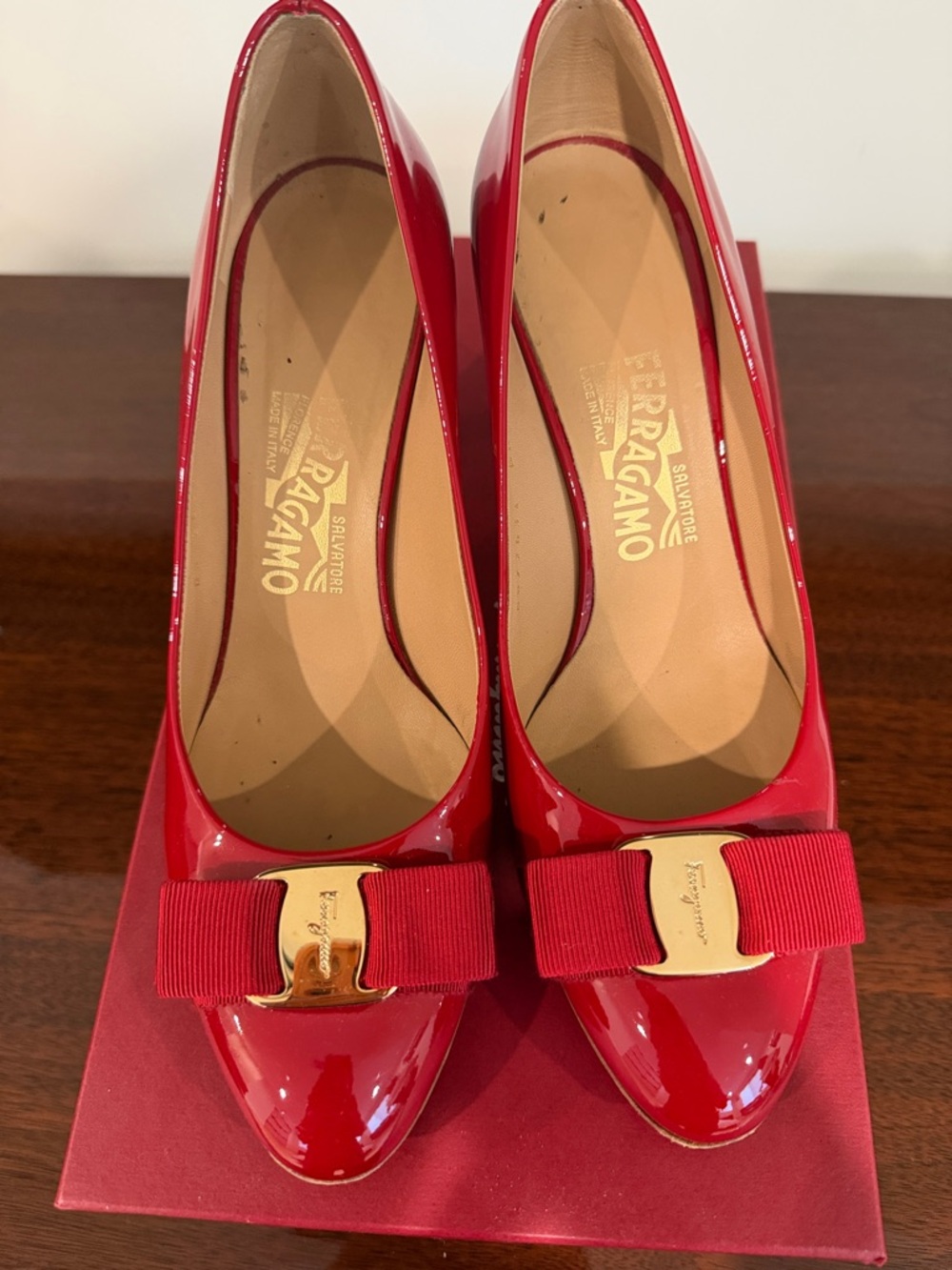 Salvatore Ferragamo Red Patent Vara Bow Pumps with Gold Hardware